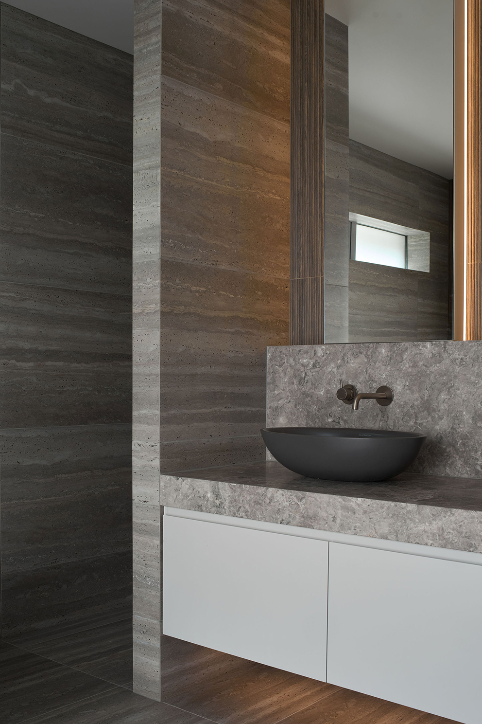 Travertine Dream — bathroom by Michelle Lamb Interior Architecture, Canterbury — NKBA Excellence in Design 2025